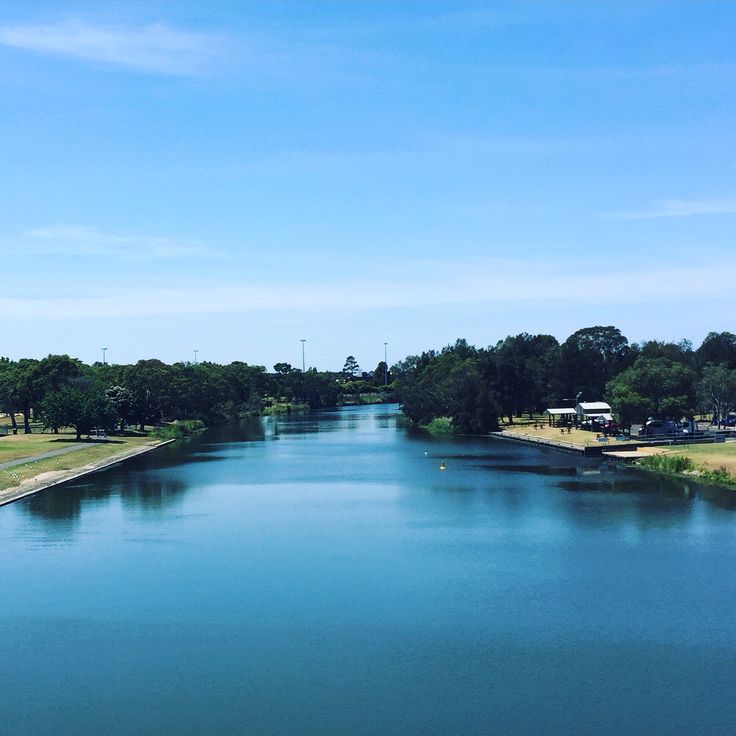 Peaceful view of the Barwon River in Geelong, featuring calm waters and green parklands ideal for therapeutic outdoor sessions